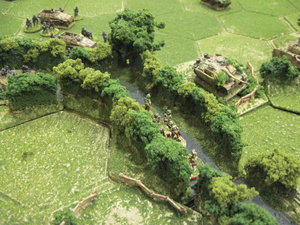 The British infantry assault along the lane, stopped by German armour.