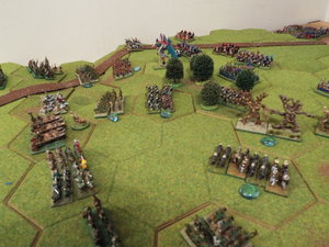 The orc left flank becomes embroiled in melee- but a strong force of elven cavalry still wait to the rear