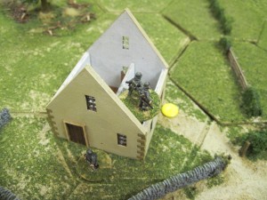 German infantry about to loose possession of the farmhouse protecting the road.