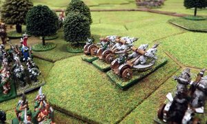 The chariots lead the orc right flank forward