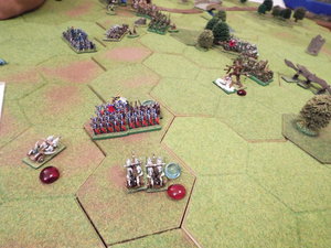 The elf spearmen and general prepare to despatch the remnants of 2 units of heavy chariots