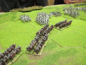 Four units of mounted crossbows attack the left wing of the Tudor battle line