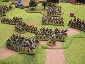 Saxon housecarls push back the Norman infantry towards their base edge