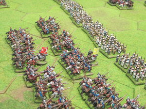 The Ottoman Sipahis and Akinci cavalry wait behind the line of spearmen