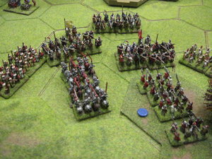 The Lancastrian heavy cavalry and billmen advance to contact in column formation.