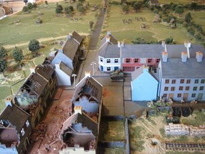 Brits defending the village the German forces attacking from the direction of the straight road and the bocage lane on the right