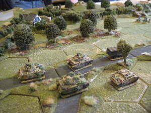 German tanks advance along the straight road
