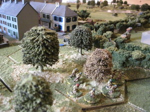 British infantry occupy the woods to the west of the village, putting an end to any German ambitions!