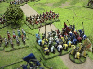 French knights ride down a unit of English longbow