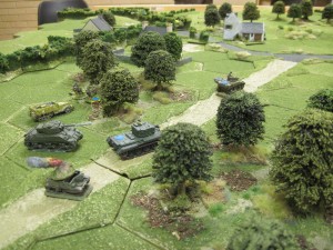 British armour advance to secure possession of the road and the primary German escape route.
