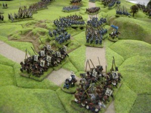 With the Korean heavy cavalry defeated the mounted Samurai advance along the road to confront the Korean light cavalry that has come across from the other wing.