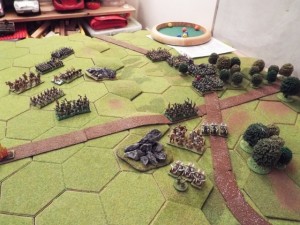 The mountain orcs crash in, with the orc horde looming near to spring forth