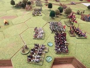 The combat result- melee forms but the orc horde advance after destroying the first unit of barbarian chariots